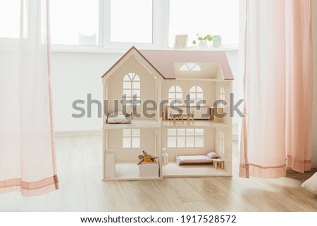 Light Doll house interior miniature. View on children room in pastel neutral colors Royalty-Free Stock Photo #1917528572