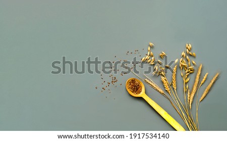 Food gray background with cereals.Creative space for the design of cereals or diet ingredients.
