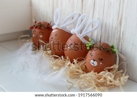 Easter eggs with animal faces, Easter bunnies and other hand-drawn animals, Easter decor made from natural materials, do it yourself