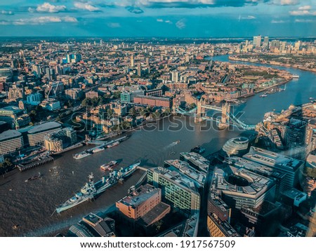 An aerial shot of London on under a blue clo