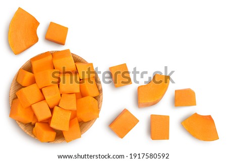 butternut squash slice in wooden bowl isolated on white background with clipping path. Top view with copy space for your text. Flat lay Royalty-Free Stock Photo #1917580592