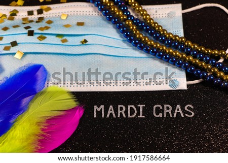 Mardi Gras Medical Facemask With Bead Strings And Feathers Abstract