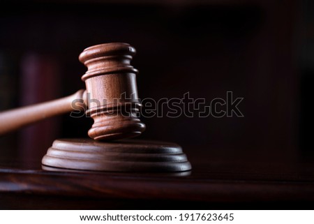 Judges gavel on wooden desk. Law firm concept. Royalty-Free Stock Photo #1917623645