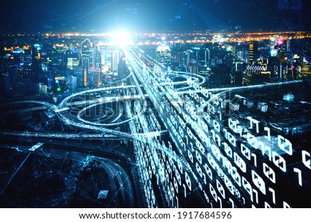 Futuristic road transportation technology with digital data transfer graphic showing concept of traffic big data analytic and internet of things . Royalty-Free Stock Photo #1917684596