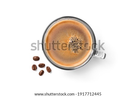 Top view of glass cup of espresso coffee and coffee beans isolated on white background Royalty-Free Stock Photo #1917712445