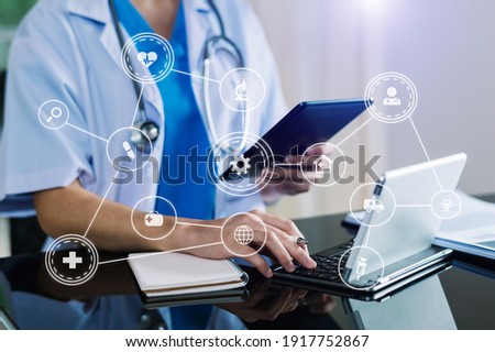 Medicine doctor and stethoscope using tablet with icon medical network connection on virtual Modern medical technology concept.
