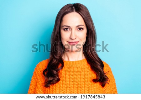 Portrait of gorgeous positive person smile look camera wear pullover isolated on pastel blue color background