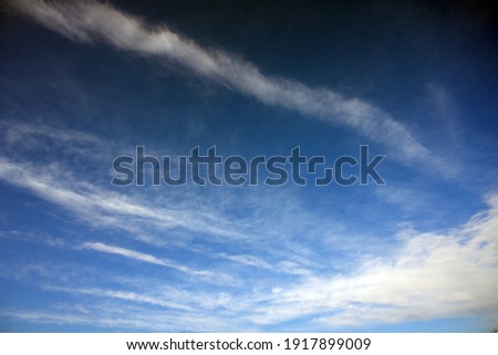 Scattered clouds and blue sky