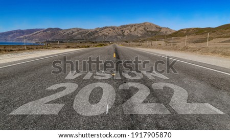 Vision 2022 written on highway road to the mountain