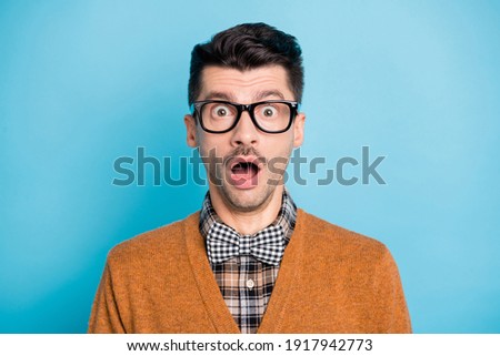 Photo of astonished young man open mouth unbelievable information isolated on pastel blue color background Royalty-Free Stock Photo #1917942773
