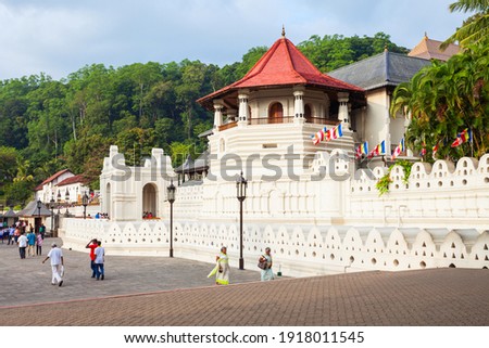 Temple of the Sacred Tooth Relic or Sri Dalada Maligawa in Kandy, Sri Lanka. Sacred Tooth Relic Temple is a Buddhist temple located in the royal palace complex of the Kingdom of Kandy. Royalty-Free Stock Photo #1918011545