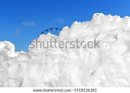 Winter landscape. Huge snowdrifts (focus on snow) in Moscow. Russia Royalty-Free Stock Photo #1918136381