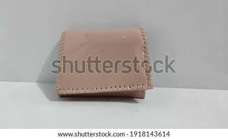 A photo of a synthetic leather bag