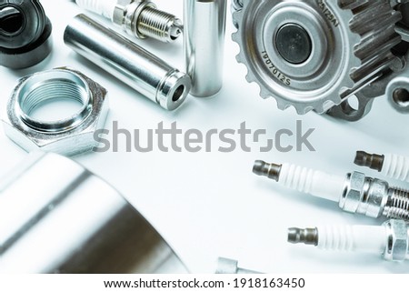 Sapre parts. Auto motor mechanic spare or automotive piece on white background. Set of new metal car part. Automobile engine service