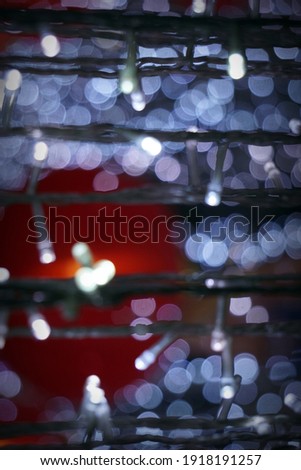 Beautiful bokeh abstract ,background 
 pictures  at night, behind a red lantern      