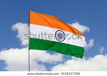 India flag isolated on the blue sky with clipping path. close up waving flag of India. flag symbols of India.