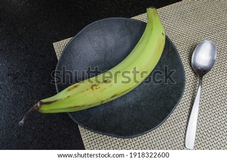 Beautiful black slate plate with banana