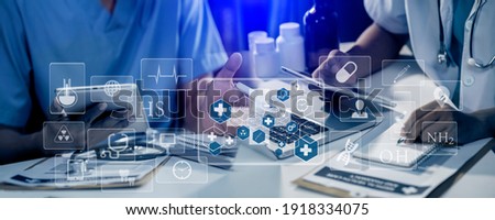 Double exposure of technology healthcare And Medicine concept. Doctors team working with modern virtual screen interface icons panoramic banner, blurred background.