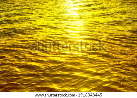 Ocean sunset is light yellow Royalty-Free Stock Photo #1918348445