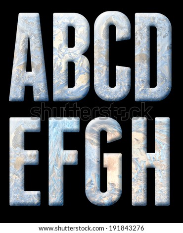 Frozen alphabet, numbers and punctuation. On a black background.