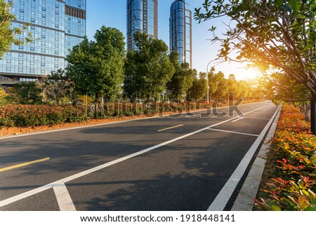 Empty urban road and buildings in the city Royalty-Free Stock Photo #1918448141