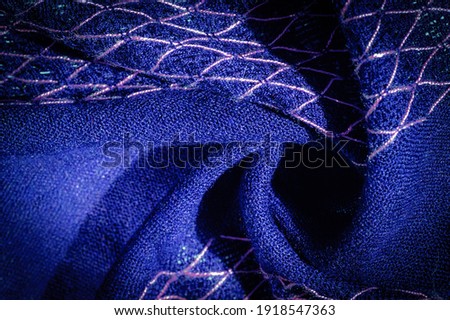 Blue woolen fabric, Woolen shawl with threads on the fabric. This wool print shawl was created especially for the modern woman who knows her mind. Pair this stunning stole with a western suit