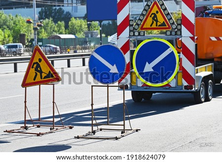Sign and fence on road construction work