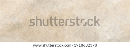 Weathered stone wall texture. Rustic wall background.Beige stone surface. Royalty-Free Stock Photo #1918682378