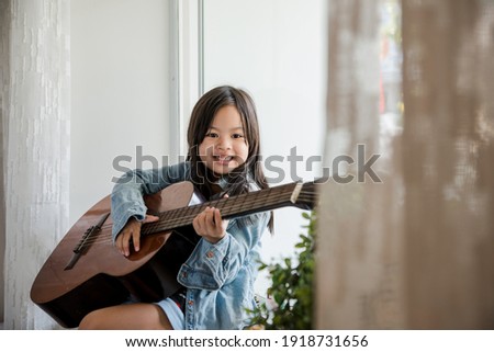 Girl Play Guitar Studying happy window light home