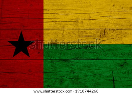 Flag of Guinea-Bissau. Wooden texture of the flag of Guinea-Bissau.