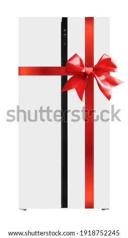 Major appliance - Front view white two-door side by side refrigerator fridge gift tied red bow on a white background. Isolated Royalty-Free Stock Photo #1918752245