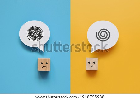 Two cubes with a pattern of confusion of one and a clear line at the other. Confusion from one person's thoughts and clarity in the head of another Royalty-Free Stock Photo #1918755938