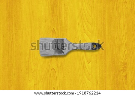 Grey brush on yellow background, trend colors of 2021 year. Ultimate Gray and Illuminating
