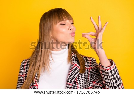 Photo of adorable person closed eyes arm fingers show gourmet gesture isolated on yellow color background Royalty-Free Stock Photo #1918785746