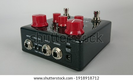 Electric guitar effect jack input isolated on white background. 