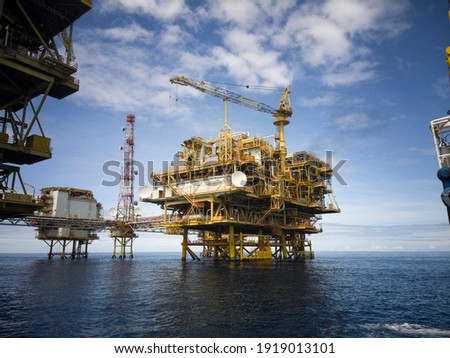Photo of Oil platform at the ocean with selective background Royalty-Free Stock Photo #1919013101