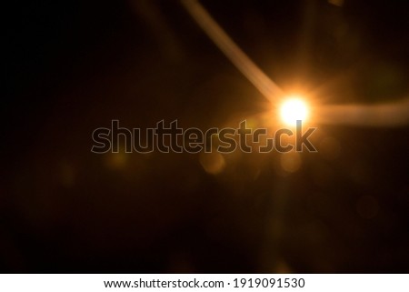 Abstract Natural Sun flare on the black Royalty-Free Stock Photo #1919091530
