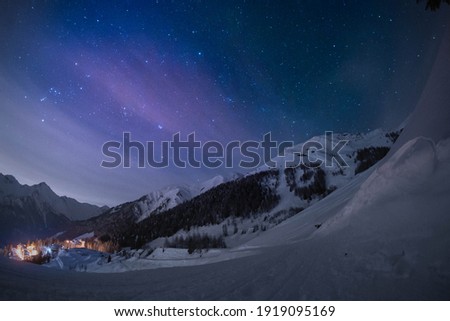 winter sky with snow on the alps