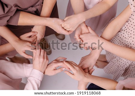 circle from female hands. Feminism nursing support concept. Together women help each other. Gently touch. Carefully. Partnership friends. Tactility. Offline communication togetherness. Gentle tones Royalty-Free Stock Photo #1919118068