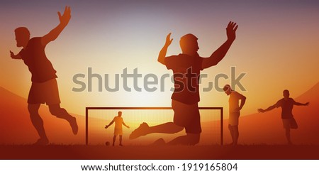 Game action during a soccer match with a team exulting after scoring a goal. Royalty-Free Stock Photo #1919165804