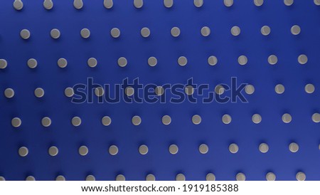 Abstract rotating dark blue background with white round dots, seamless loop. Animation. Spinning pattern with white circles contrasting to blue backdrop.