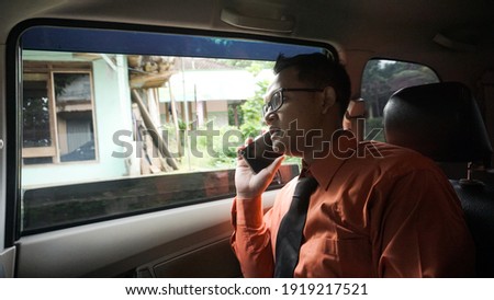 businessman on the phone in the car