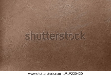close up brown leather texture background. abstract vintage concept background. top view of genuine leather.