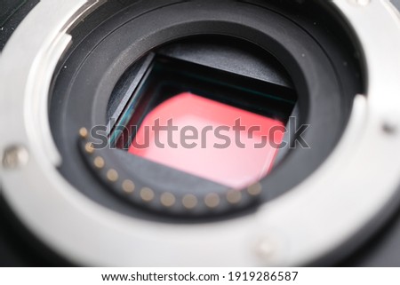 Dirty camera mount of micro four thirds sensor in the mirrorless system Royalty-Free Stock Photo #1919286587