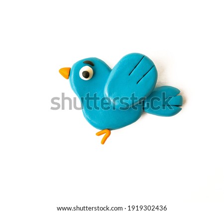 plasticine blue bird on a white background