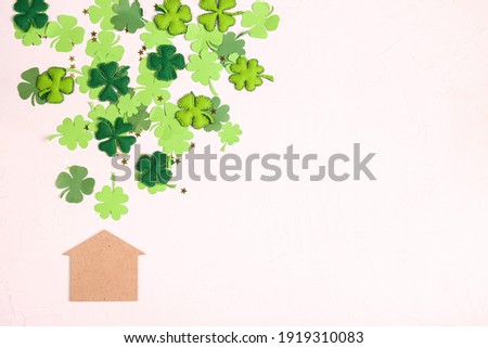 Lucky home symbol with four-leaf clover on white  background. Copy space for text. St.Patrick's day concept. 