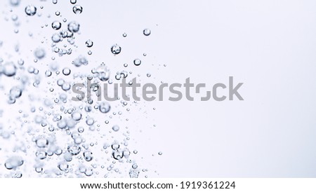 Light bubbles of water isolated over white, macro shot.