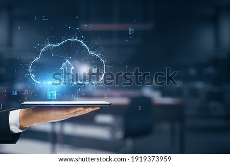 Global cloud service concept with digital cloud sign with arrow up above businessman hand with digital tablet. Double exposure
