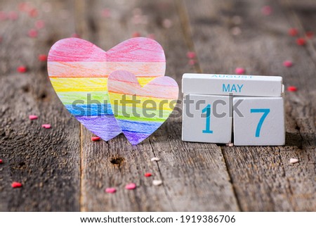 Wooden calendar with date 17 May and heart painted in rainbow color. International Day Against Homophobia, Transphobia and Biphobia. LGBT. Royalty-Free Stock Photo #1919386706