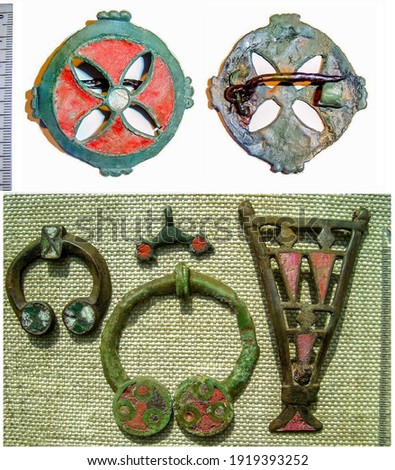 brooches and pendant are made using champlevé enamel technique of late antiquity of the 3-5th century. AD, Eastern Europe, early Slavs
bronze fibula. Artifact, archaeological discoveries, search for t